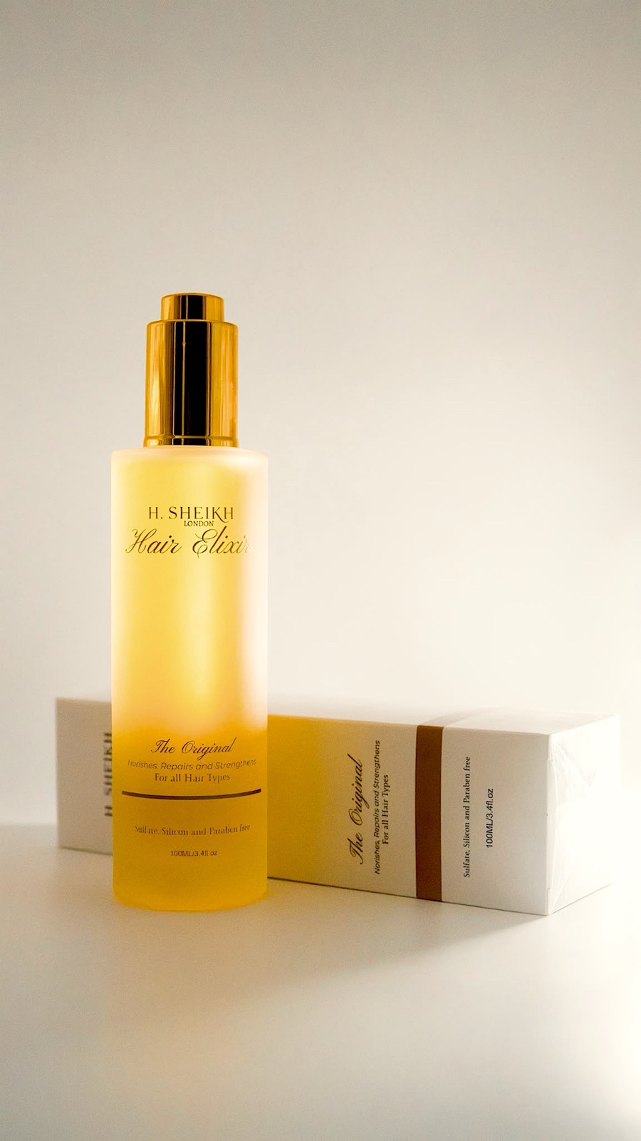 H. SHEIKH LONDON Hair Elixir, bottle and packaging together